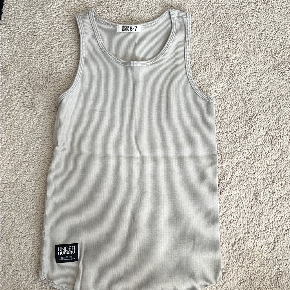 Under Armour Sleeveless Top. Total 3 pieces. Like new.